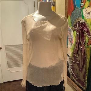 Sheer long sleeve crew neck top.